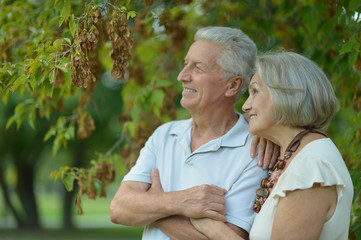 Happy nice mature couple walking