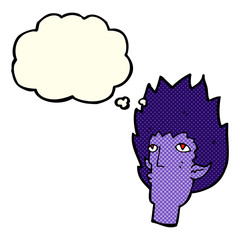 cartoon vampire face with thought bubble