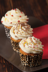 Cupcakes With Cream And Sprinkles