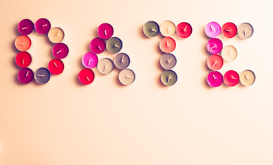 Tea Candles Arranged to Word Date