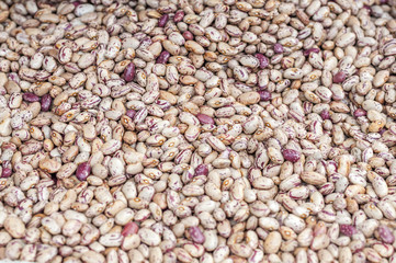 Close up gray beans on a market, background