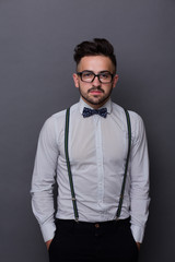 Serious hipster man in studio