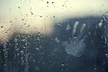 water drops background with chid's hand