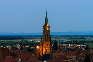 Fototapeta na wymiar Beautiful moonrise over the church, Alsace