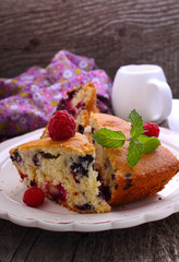 slices of homemade cake with berries