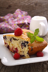 slices of homemade cake with berries