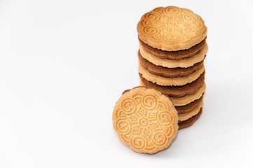 Top view of chocolate sandwich cookies over white