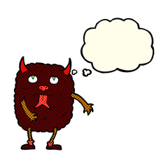 funny cartoon monster with thought bubble