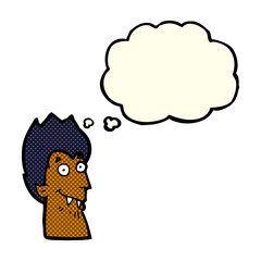 cartoon vampire head with thought bubble