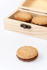 Fototapeta na wymiar Chocolate biscuits in the wooden retro box
