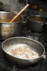 stir fried clams in pan for dinner