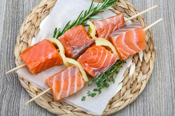 Raw salmon skewers
