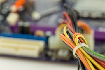 Cables connected to computer motherboard