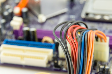 Cables connected to computer motherboard