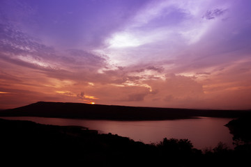 Fototapeta na wymiar Silhouette of Lam Takong reservoir dam with mountain
