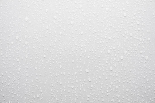 water drop on white surface