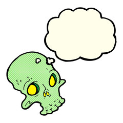 cartoon spooky skull with thought bubble