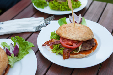 A close-up of tasty- look hamburger.