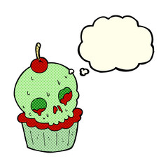 cartoon halloween cup cake with thought bubble
