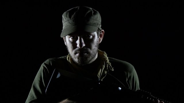  Bearded Soldier With Rifle  in the Dark Aiming  in the Camera