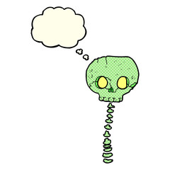 cartoon spooky skull and spine with thought bubble