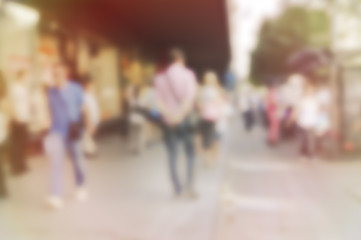 High blurred image of workers going back home after work.