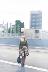 young handsome redhead caucasian woman posing