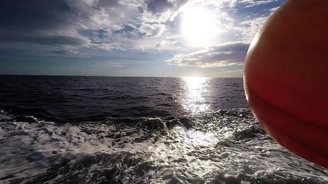 Boat Cuts Through the Ocean Water - Slow Motion