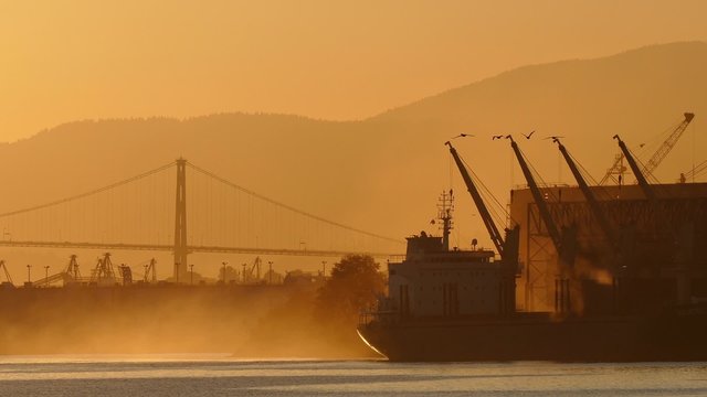Sunrise Scene Of Ship In The Bay