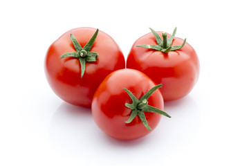 Tomato on the white isolatd background.