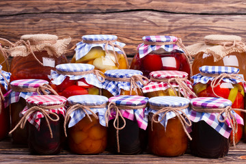  Many glass jars with food.