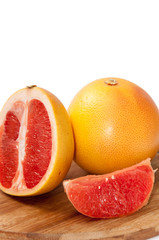 Grapefruit slice on the wooden board