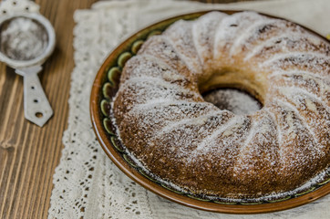 Curd pudding with semolina and apples seeding the powdered sugar   