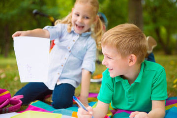 Happy boy cycling in park