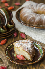 Curd pudding with semolina and apples seeding the powdered sugar   