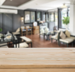 Wood table top with blur interior background