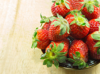 Fresh strawberries on a bowl.