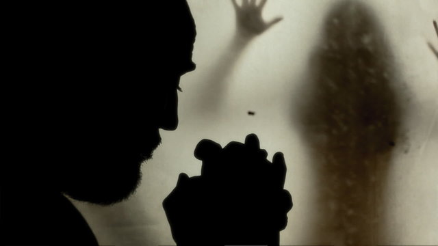 Silhouette man praying body shadows