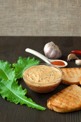 Pate Apetiser with melba toast soldiers and small salad on dark