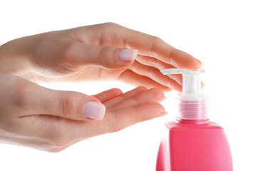 Female hands with cream isolated on white