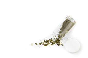 marijuana in medicine bottle on white background