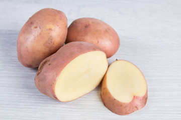 potatoes on a wooden background