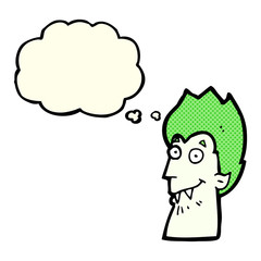 cartoon vampire head with thought bubble