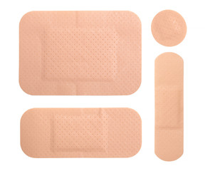 different medical adhesive plasters isolated on white
