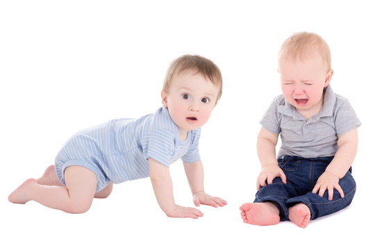 amazed baby boy toddler and his friend crying isolated on white
