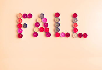 Tea Candles Arranged to Word Fall