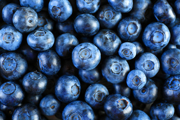 Heap of tasty ripe blueberries close up