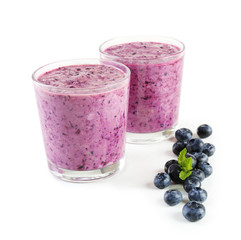 Glasses of blueberry smoothie, closeup