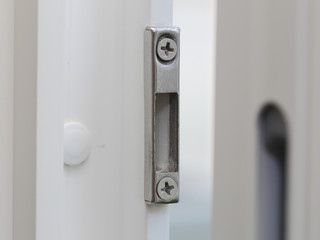 close up of window shutter locking device