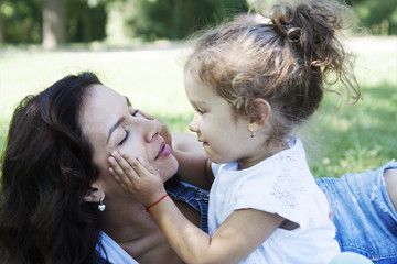 Mom and daughter in nature